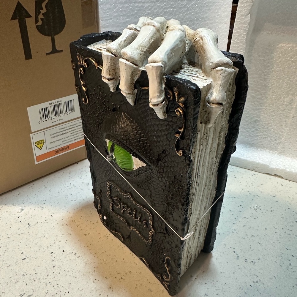 NWT/NIB Lighted Spooky Spells Resin Book with skeleton hand